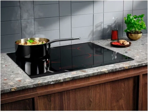 Индукционная варочная поверхность Electrolux EIP6446 черный